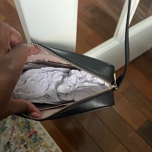 Kate spade.   6"h x 9.6"w x 3.3"d

* interior back zip pocket